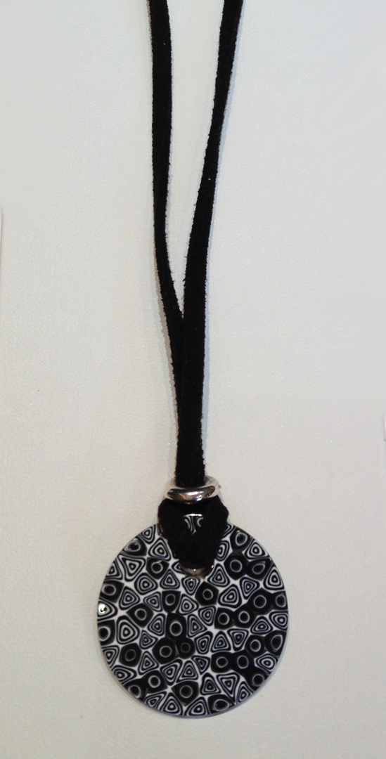 Murrano Milli Fiori glass pendant on leather cord.