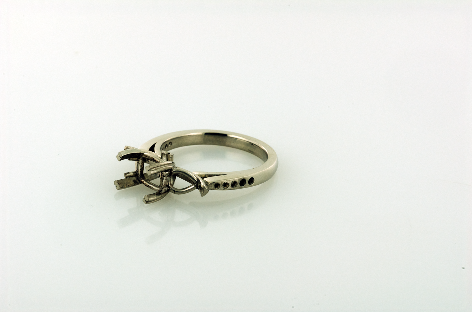 Three stone platinum ring before setting
