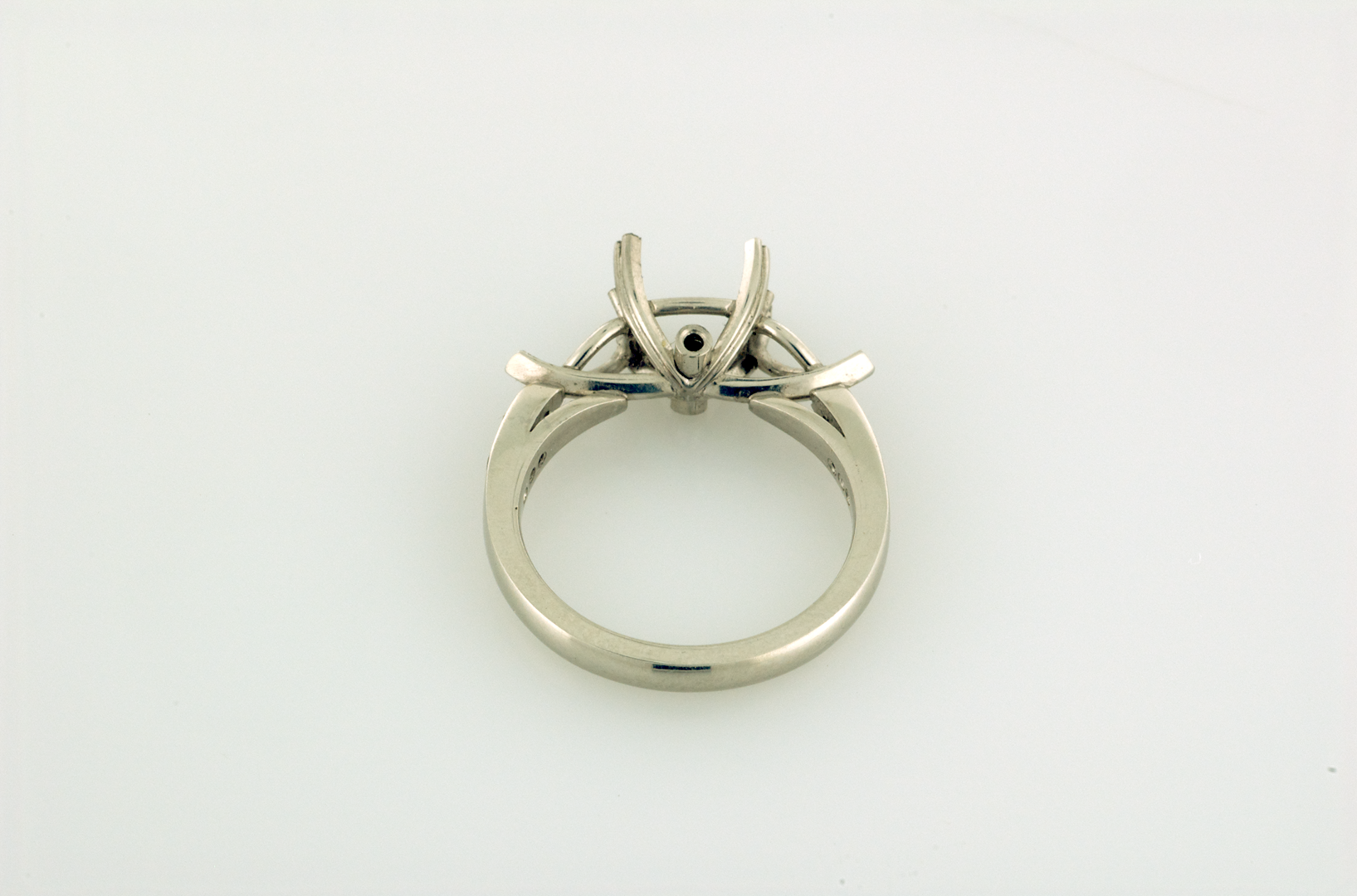 Three stone platinum ring before setting Copyrighted Original by Thomas Michaels
