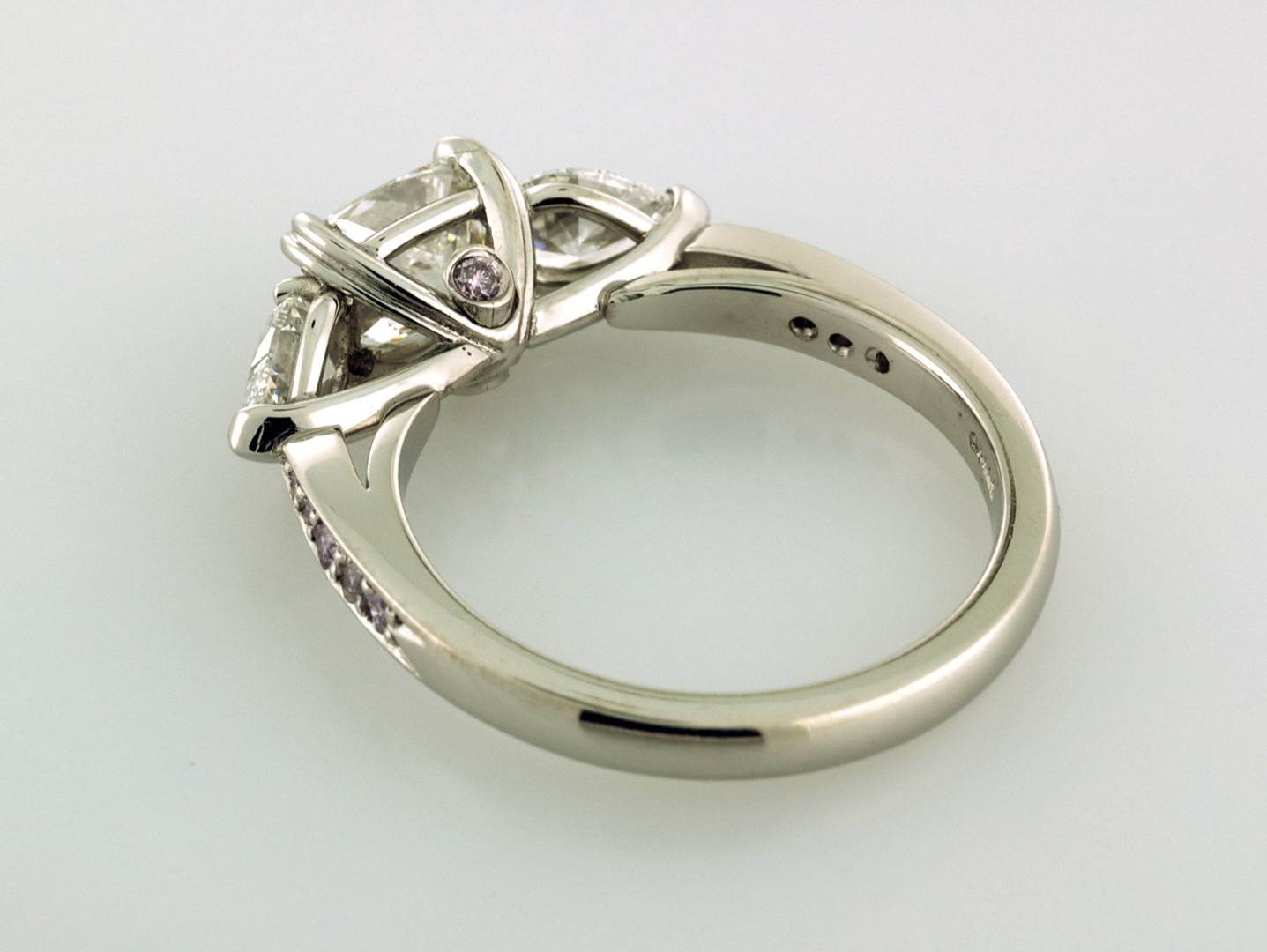 Three stone platinum ring with secret diamond  