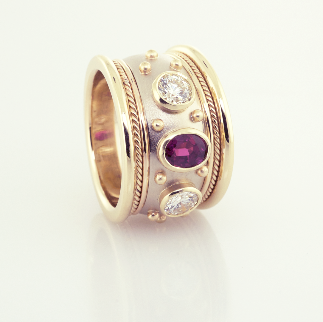 Ruby and diamond cigar ring in 14KT white and yellow gold, front view