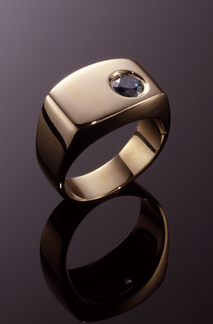 14KT gold and treated blue diaond gents ring