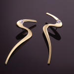 Gold and diamond (.50ct) "S" earring 