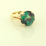 18KT gold and green tourmaline (16.00ct.) hand fabricated ring