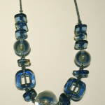 Blue Italian glass bead necklace 20" long.