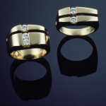 14KT yellow gold rings one set with .40ct. and one with .60ct.