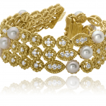 Diamond and pearl three row bracelet set in 18KT yellow gold
