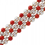 Bracelet, flexible in coral, pearls, diamond and 18KT white and yellow gold