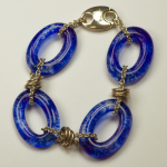 Sterling Silver & glass bracelet by Nora, Blue