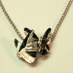 18KT and sapphire (1.50ct.) butterfly motif pendant