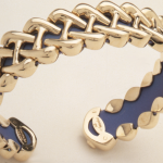 18KT yellow gold and titanium flexible Celtic braid medium cuff bracelet.