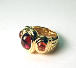 18KT gold and sapphires, cabochon cut, ring.