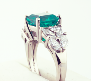 3.00ct. Emerald and diamond ring set in platinum and 18KT yellow gold.