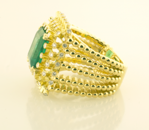 emerald and diamonds and 18KT yellow gold ring