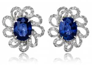 Blue Sapphire and diamond earrings set in a floral motif