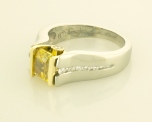 Man made radiant cut 1.57ct. yellow diamond ring