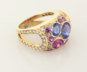 Sapphire (6.75cts.) and Diamonds (.75ct.) set in 18KT yellow gold confetti ring, side view