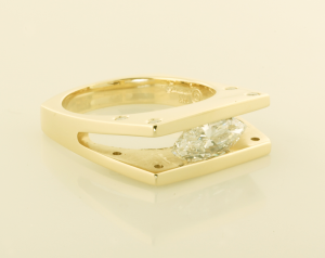 14KT yellow gold ring with a 1.08ct. marquise diamond