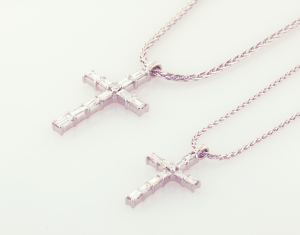 Platinum and diamond crosses on platinum wheat chains large set with 1.20ct. and small .55ct.